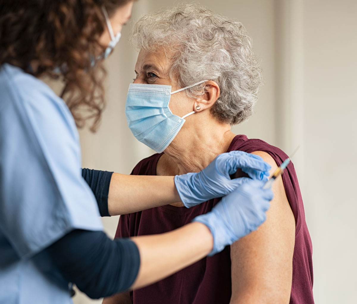 SFT-26169_1200x1020px_iStock-1284869084 senior woman getting a vaccine from a healthcare worker