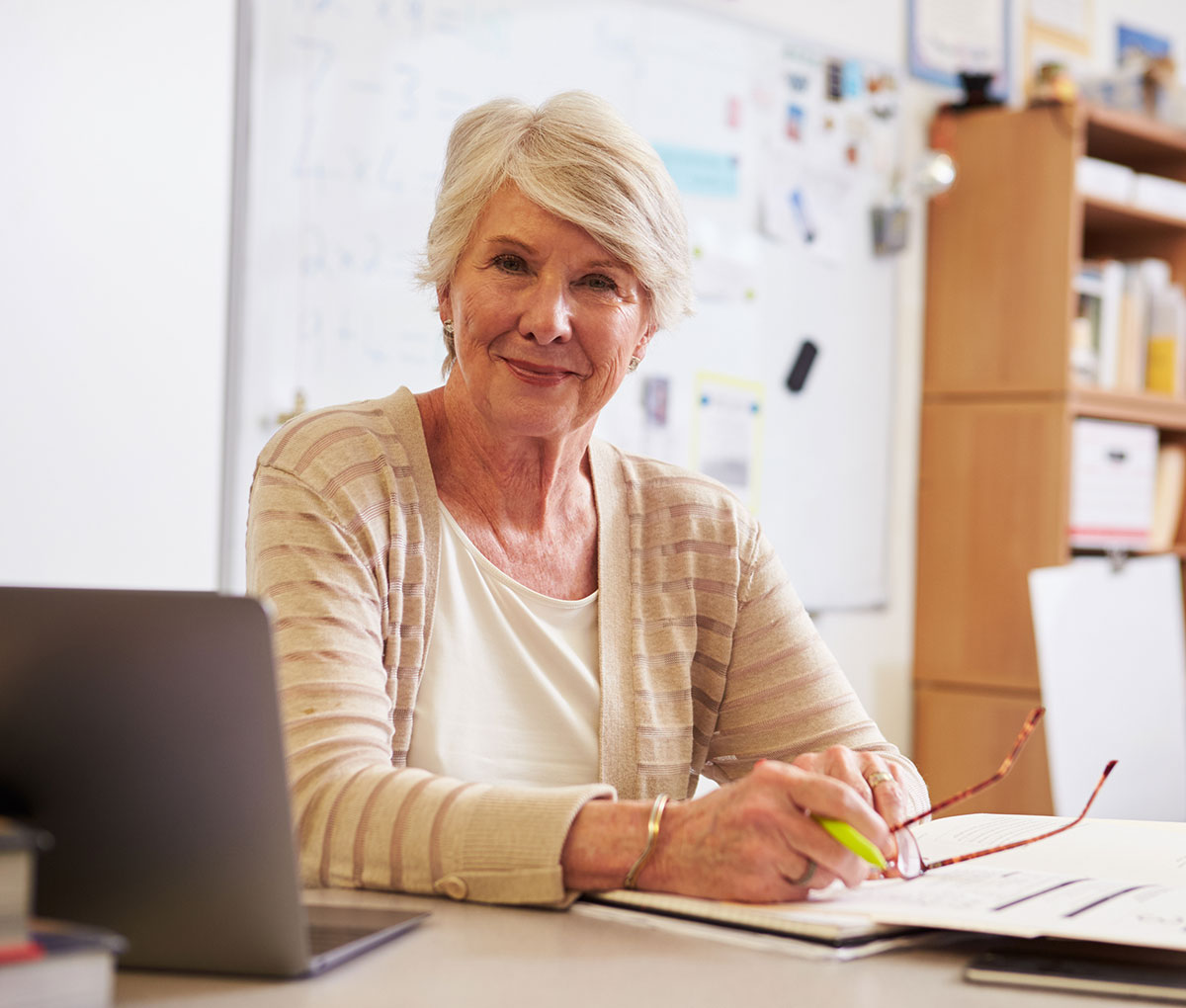 iStock-515264384_1200x1020 Senior woman reviewing her finances