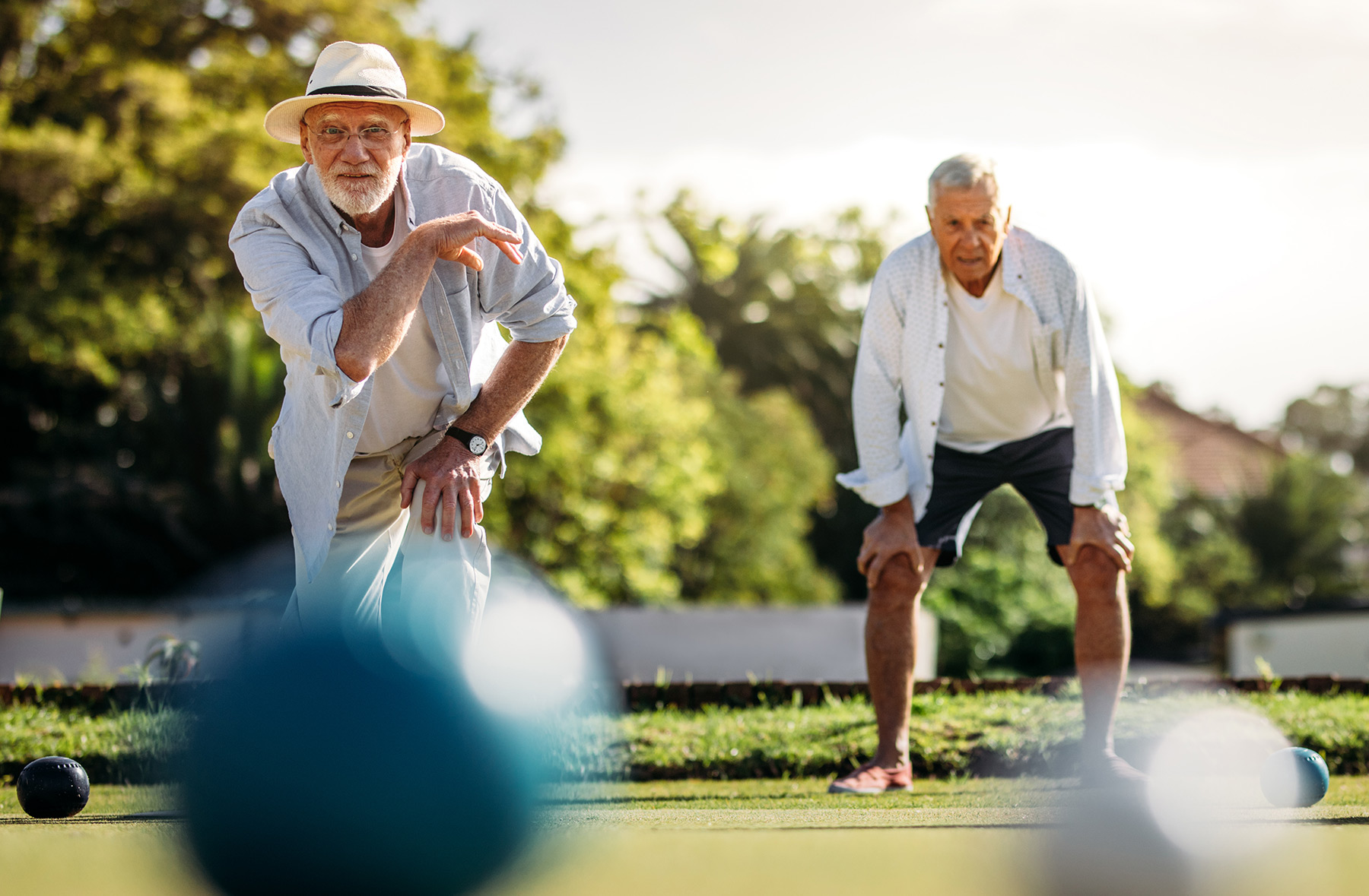 two senior men playing Bocce Ball