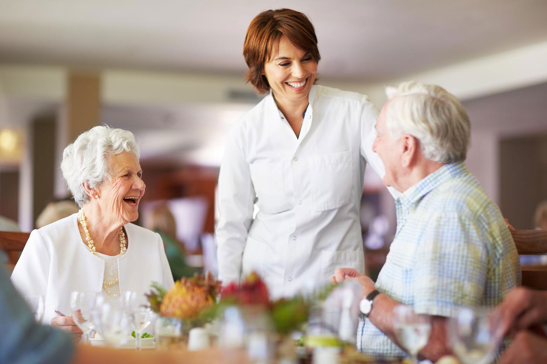 seniors ordering from a waitress at a restaurant